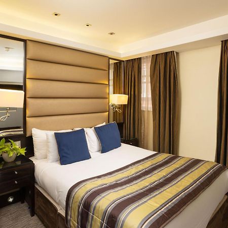 Park Grand Mayfair London Luaran gambar A bedroom at the hotel
