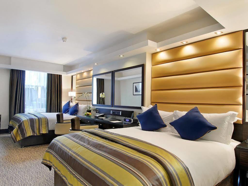 Park Grand Mayfair London Luaran gambar A bedroom at the Hilton London Paddington